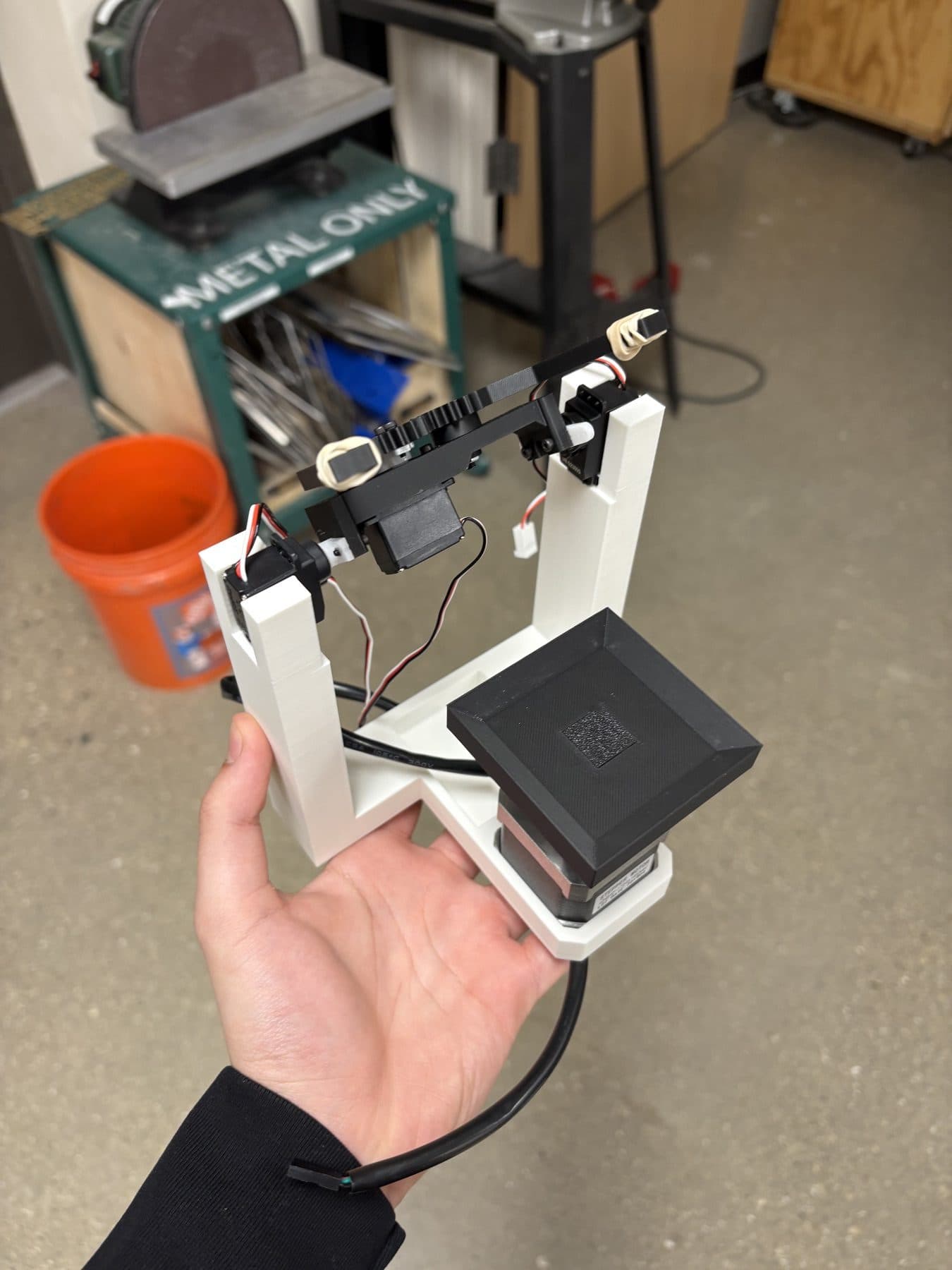 The solver's turntable, tilt servos, and claw arm